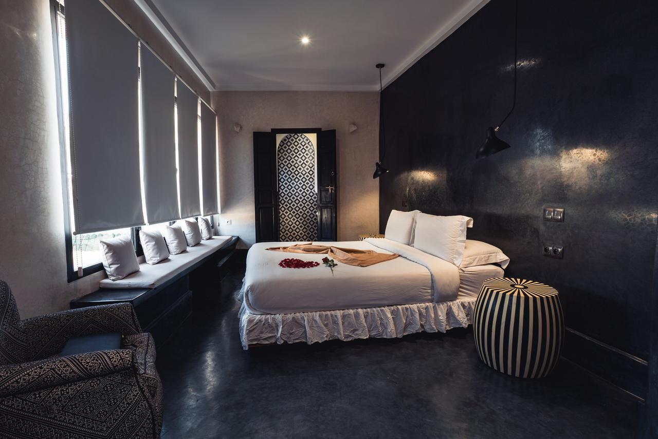 Ambre Epices Medina Riad Marrakesh Buitenkant foto A bedroom at the hotel